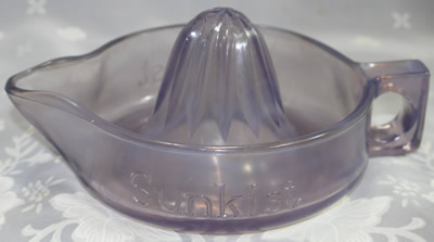 Straight handle purple glass Sunkist juicer