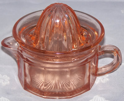 Reproduction pink glass 2 piece cup juicer