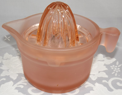 Pink satin U.S. Glass Company juicer with crickets