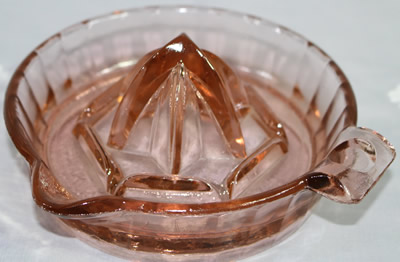 Hazel Atlas unembossed pink glass juicer