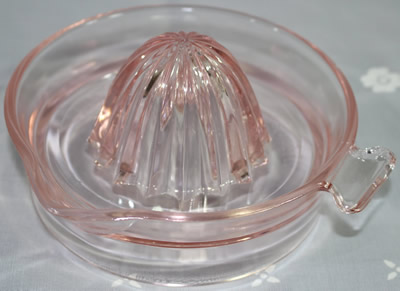 Embossed ORANGE JUICE EXTRACTOR Pink glass juicer