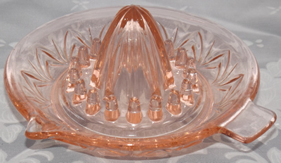 Gebedje pink glass saucer juicer