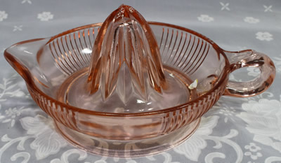 Large pink ribbed Federal juicer