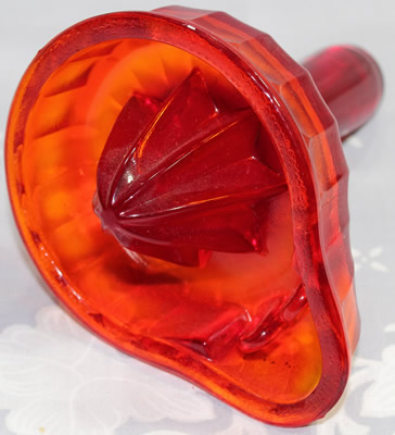 Reproduction red glass Duboe hand held juicer