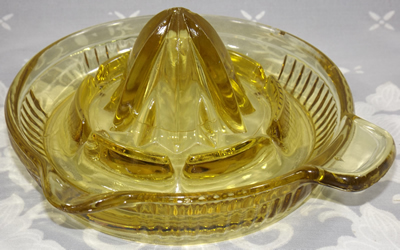 Gold Federal Glass Co tab handle juicer