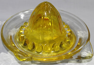 Yellow and clear glass 'Margarita Set" saucer juicer