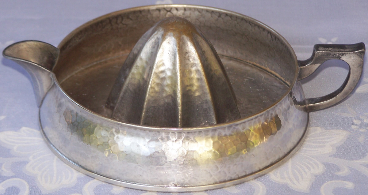 Apollo hammered silver plate juicer
