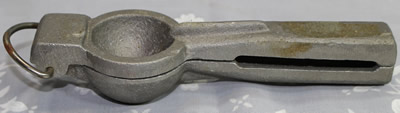 A Ra Chand aluminium hand squeezer juicer