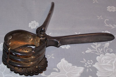 Silver plate William Hutton and Sons or Christofle squeezer