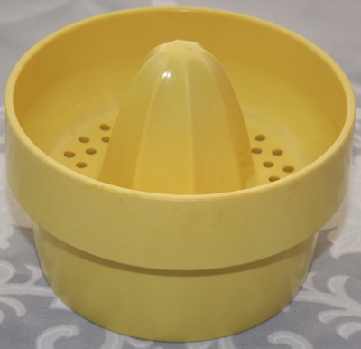 Yellow Australian cocktail shaker juicer top