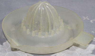 Translucent white plastic juicer