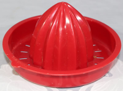 Dark red Tupperware juicer top
