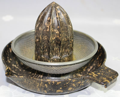 Shades of brown mottled bakelite 3 piece juicer