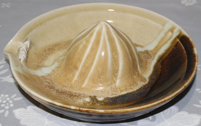 Cream through to brown pottery juicer