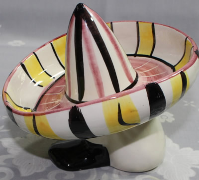 Mexican man with sombrero that looks like a juicer