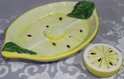 Two parts of an unusual Italian lemon shape 'juicer'